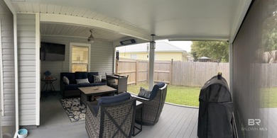 Coastal charm meets comfort in this move-in ready 3-bedroom on Orange Beach Golf Center in Alabama - for sale on GolfHomes.com, golf home, golf lot