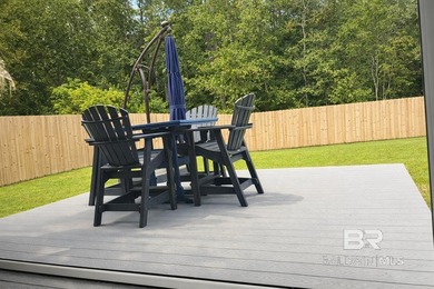 Coastal charm meets comfort in this move-in ready 3-bedroom on Orange Beach Golf Center in Alabama - for sale on GolfHomes.com, golf home, golf lot