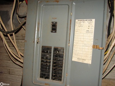 This 1.5-story, 3-bedroom, 1-bath home is a perfect opportunity on Twin Lakes Golf Course in Iowa - for sale on GolfHomes.com, golf home, golf lot