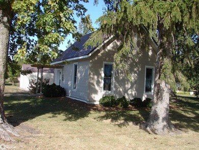 This 1.5-story, 3-bedroom, 1-bath home is a perfect opportunity on Twin Lakes Golf Course in Iowa - for sale on GolfHomes.com, golf home, golf lot