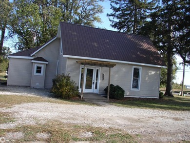 This 1.5-story, 3-bedroom, 1-bath home is a perfect opportunity on Twin Lakes Golf Course in Iowa - for sale on GolfHomes.com, golf home, golf lot