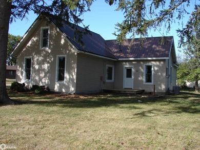 This 1.5-story, 3-bedroom, 1-bath home is a perfect opportunity on Twin Lakes Golf Course in Iowa - for sale on GolfHomes.com, golf home, golf lot