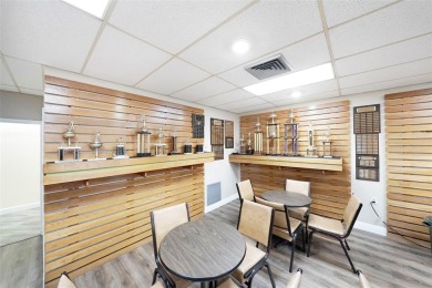 Beautifully remodeled 2-bedroom, 2-bath unit on the 1st floor on Sunrise Lakes Phase IV Golf Course in Florida - for sale on GolfHomes.com, golf home, golf lot