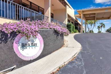 Terra Ceia Bay Turn-key furnished 3 bedroom, 2 bath end unit on Terra Ceia Golf and Country Club in Florida - for sale on GolfHomes.com, golf home, golf lot