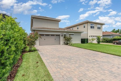 Discover this immaculate two-story Mediterranean-style home in on Eagle Creek Golf Club in Florida - for sale on GolfHomes.com, golf home, golf lot