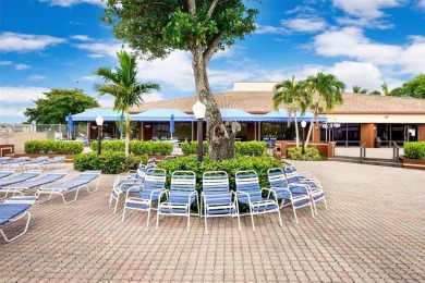 Beautifully remodeled 2-bedroom, 2-bath unit on the 1st floor on Sunrise Lakes Phase IV Golf Course in Florida - for sale on GolfHomes.com, golf home, golf lot