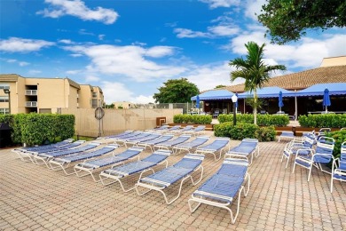 Beautifully remodeled 2-bedroom, 2-bath unit on the 1st floor on Sunrise Lakes Phase IV Golf Course in Florida - for sale on GolfHomes.com, golf home, golf lot