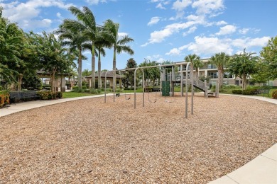 Discover this immaculate two-story Mediterranean-style home in on Eagle Creek Golf Club in Florida - for sale on GolfHomes.com, golf home, golf lot