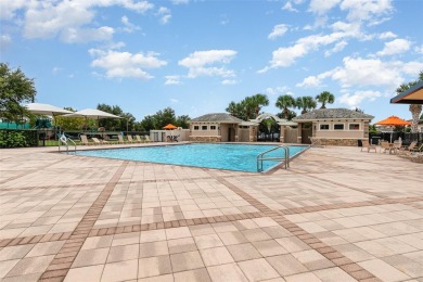 Discover this immaculate two-story Mediterranean-style home in on Eagle Creek Golf Club in Florida - for sale on GolfHomes.com, golf home, golf lot