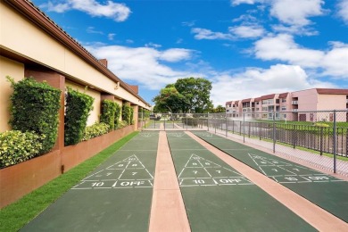Beautifully remodeled 2-bedroom, 2-bath unit on the 1st floor on Sunrise Lakes Phase IV Golf Course in Florida - for sale on GolfHomes.com, golf home, golf lot
