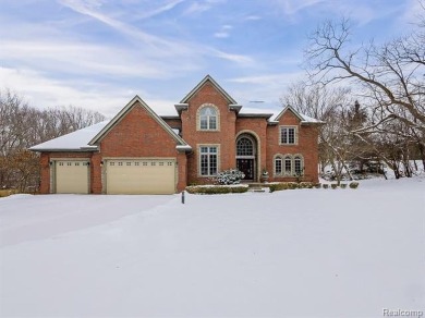 This stunning brick colonial masterpiece sits on a large on Farmington Hills Golf Club in Michigan - for sale on GolfHomes.com, golf home, golf lot