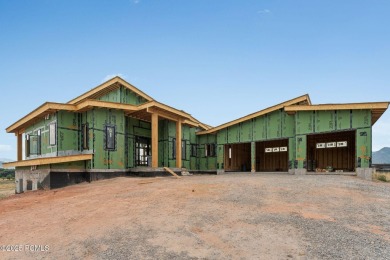 Tucked into the rugged beauty of Utah's high country, where red on Red Ledges Golf Club in Utah - for sale on GolfHomes.com, golf home, golf lot