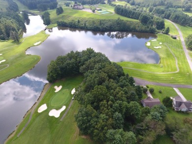 This beautiful lot overlooks the lake and 13th green on the on The Clubs of Olde Mill in Virginia - for sale on GolfHomes.com, golf home, golf lot