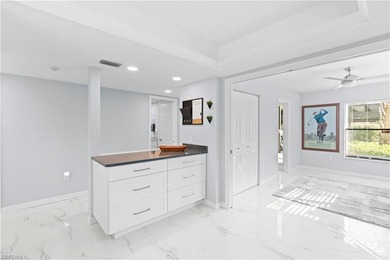 Such a sunny and welcoming place to call home! This completely on The Forest Country Club in Florida - for sale on GolfHomes.com, golf home, golf lot