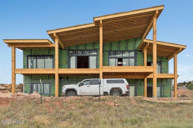 Tucked into the rugged beauty of Utah's high country, where red on Red Ledges Golf Club in Utah - for sale on GolfHomes.com, golf home, golf lot