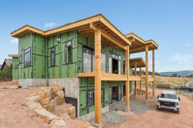 Tucked into the rugged beauty of Utah's high country, where red on Red Ledges Golf Club in Utah - for sale on GolfHomes.com, golf home, golf lot