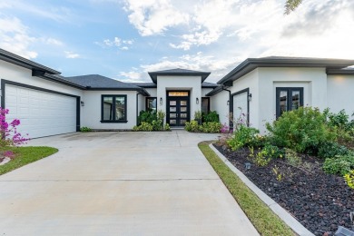 Discover your dream home at 29 Whooping Crane, a stunning on South Padre Island Golf Club in Texas - for sale on GolfHomes.com, golf home, golf lot