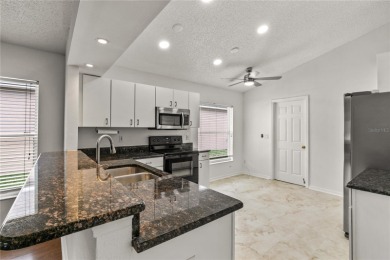 This Oxford Model Features 2 Bedrooms, 2 Baths, Den and a on Kings Ridge Golf Club in Florida - for sale on GolfHomes.com, golf home, golf lot