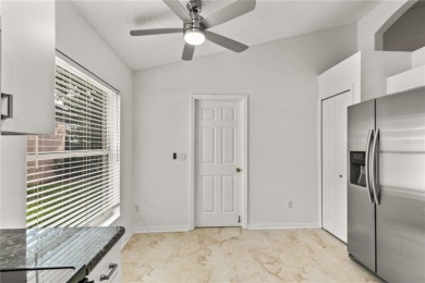 This Oxford Model Features 2 Bedrooms, 2 Baths, Den and a on Kings Ridge Golf Club in Florida - for sale on GolfHomes.com, golf home, golf lot