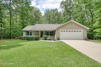 Welcome Home! This 2 bedroom with a bonus room, 2 bath home is on Lake Tansi Village Country Club in Tennessee - for sale on GolfHomes.com, golf home, golf lot