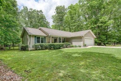 Welcome Home! This 2 bedroom with a bonus room, 2 bath home is on Lake Tansi Village Country Club in Tennessee - for sale on GolfHomes.com, golf home, golf lot