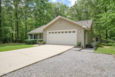 Welcome Home! This 2 bedroom with a bonus room, 2 bath home is on Lake Tansi Village Country Club in Tennessee - for sale on GolfHomes.com, golf home, golf lot