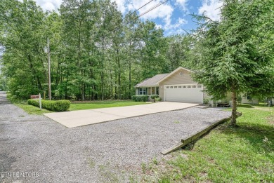 Welcome Home! This 2 bedroom with a bonus room, 2 bath home is on Lake Tansi Village Country Club in Tennessee - for sale on GolfHomes.com, golf home, golf lot