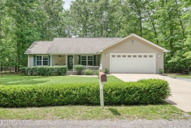Welcome Home! This 2 bedroom with a bonus room, 2 bath home is on Lake Tansi Village Country Club in Tennessee - for sale on GolfHomes.com, golf home, golf lot