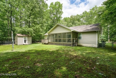 Welcome Home! This 2 bedroom with a bonus room, 2 bath home is on Lake Tansi Village Country Club in Tennessee - for sale on GolfHomes.com, golf home, golf lot