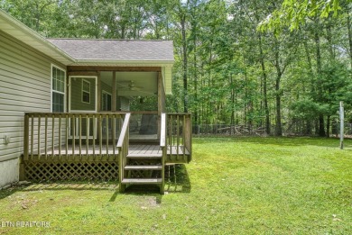 Welcome Home! This 2 bedroom with a bonus room, 2 bath home is on Lake Tansi Village Country Club in Tennessee - for sale on GolfHomes.com, golf home, golf lot