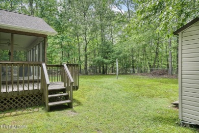 Welcome Home! This 2 bedroom with a bonus room, 2 bath home is on Lake Tansi Village Country Club in Tennessee - for sale on GolfHomes.com, golf home, golf lot