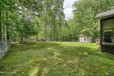 Welcome Home! This 2 bedroom with a bonus room, 2 bath home is on Lake Tansi Village Country Club in Tennessee - for sale on GolfHomes.com, golf home, golf lot