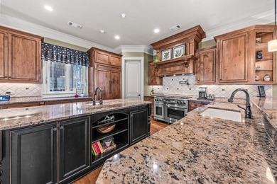 Perfectly positioned along the 5th hole of the Jack on Great Waters Course At Reynolds Plantation in Georgia - for sale on GolfHomes.com, golf home, golf lot