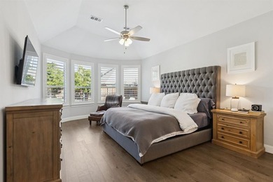 Welcome to this stunning Highland home in the highly on The Tribute At the Colony in Texas - for sale on GolfHomes.com, golf home, golf lot