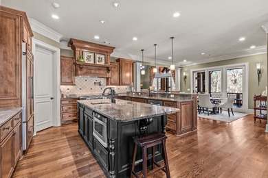 Perfectly positioned along the 5th hole of the Jack on Great Waters Course At Reynolds Plantation in Georgia - for sale on GolfHomes.com, golf home, golf lot