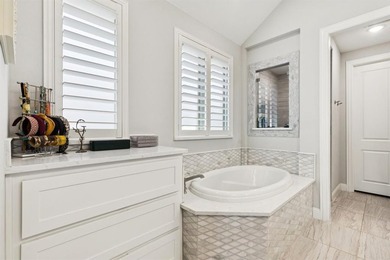 Welcome to this stunning Highland home in the highly on The Tribute At the Colony in Texas - for sale on GolfHomes.com, golf home, golf lot