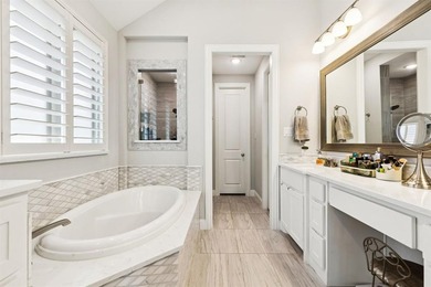 Welcome to this stunning Highland home in the highly on The Tribute At the Colony in Texas - for sale on GolfHomes.com, golf home, golf lot