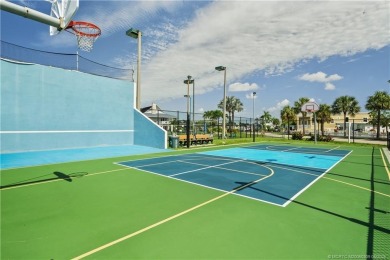 Step into coastal comfort with this 2 bedroom, 1 bathroom on Island Dunes Country Club in Florida - for sale on GolfHomes.com, golf home, golf lot