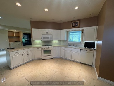 Beautiful condo overlooking the 18th fairway of Riverside Golf on Riverside Country Club in Nebraska - for sale on GolfHomes.com, golf home, golf lot