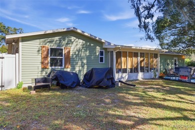 Welcome to your ideal starter home or perfect snowbird retreat on Citrus Springs Country Club in Florida - for sale on GolfHomes.com, golf home, golf lot