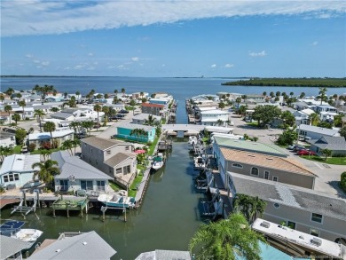 Step into coastal comfort with this 2 bedroom, 1 bathroom on Island Dunes Country Club in Florida - for sale on GolfHomes.com, golf home, golf lot