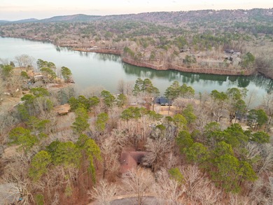 Experience year-round lakeview luxury in this meticulously on DeSoto Golf Course in Arkansas - for sale on GolfHomes.com, golf home, golf lot