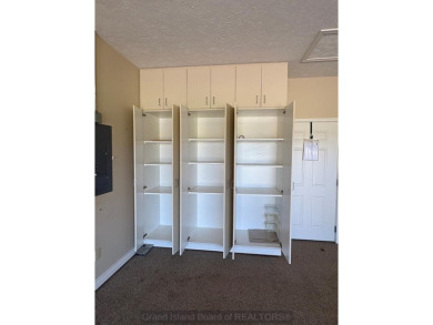 Beautiful condo overlooking the 18th fairway of Riverside Golf on Riverside Country Club in Nebraska - for sale on GolfHomes.com, golf home, golf lot