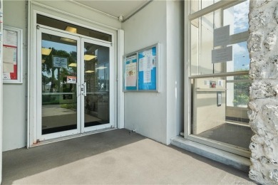 Step into coastal comfort with this 2 bedroom, 1 bathroom on Island Dunes Country Club in Florida - for sale on GolfHomes.com, golf home, golf lot