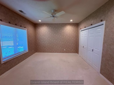 Beautiful condo overlooking the 18th fairway of Riverside Golf on Riverside Country Club in Nebraska - for sale on GolfHomes.com, golf home, golf lot