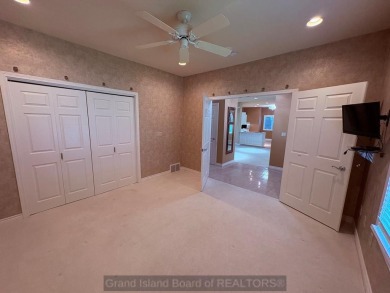 Beautiful condo overlooking the 18th fairway of Riverside Golf on Riverside Country Club in Nebraska - for sale on GolfHomes.com, golf home, golf lot