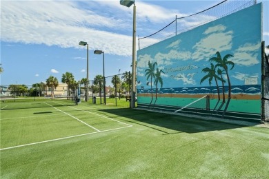 Step into coastal comfort with this 2 bedroom, 1 bathroom on Island Dunes Country Club in Florida - for sale on GolfHomes.com, golf home, golf lot