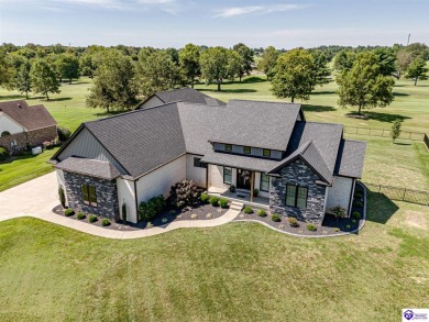 Welcome to your dream home, where luxury meets sophistication on Elizabethtown Country Club in Kentucky - for sale on GolfHomes.com, golf home, golf lot