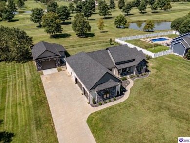 Welcome to your dream home, where luxury meets sophistication on Elizabethtown Country Club in Kentucky - for sale on GolfHomes.com, golf home, golf lot