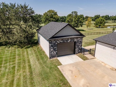 Welcome to your dream home, where luxury meets sophistication on Elizabethtown Country Club in Kentucky - for sale on GolfHomes.com, golf home, golf lot